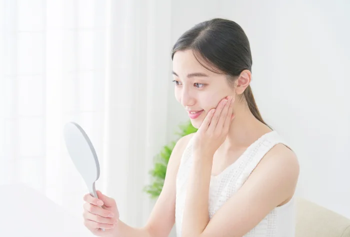 歯並びを気にする女性